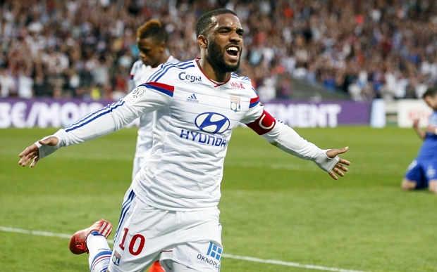 Olympique Lyon's Lacazette celebrates after scoring against Bastia during their French Ligue 1 soccer match at the Gerland stadium in Lyon